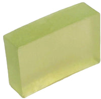 A rectangular bar of soap with a green tint and a smooth surface.