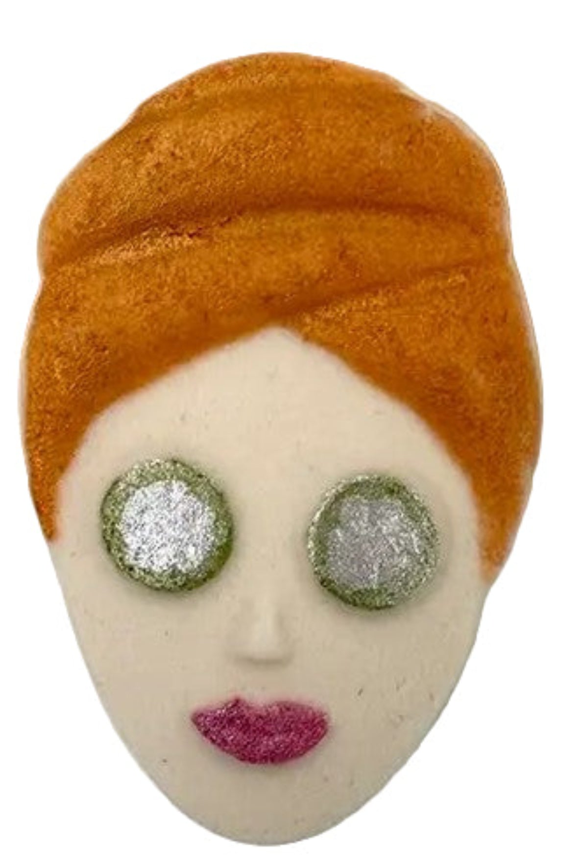 Bath Bom of a woman with orange hair, green eyes, and pink lips on a white background